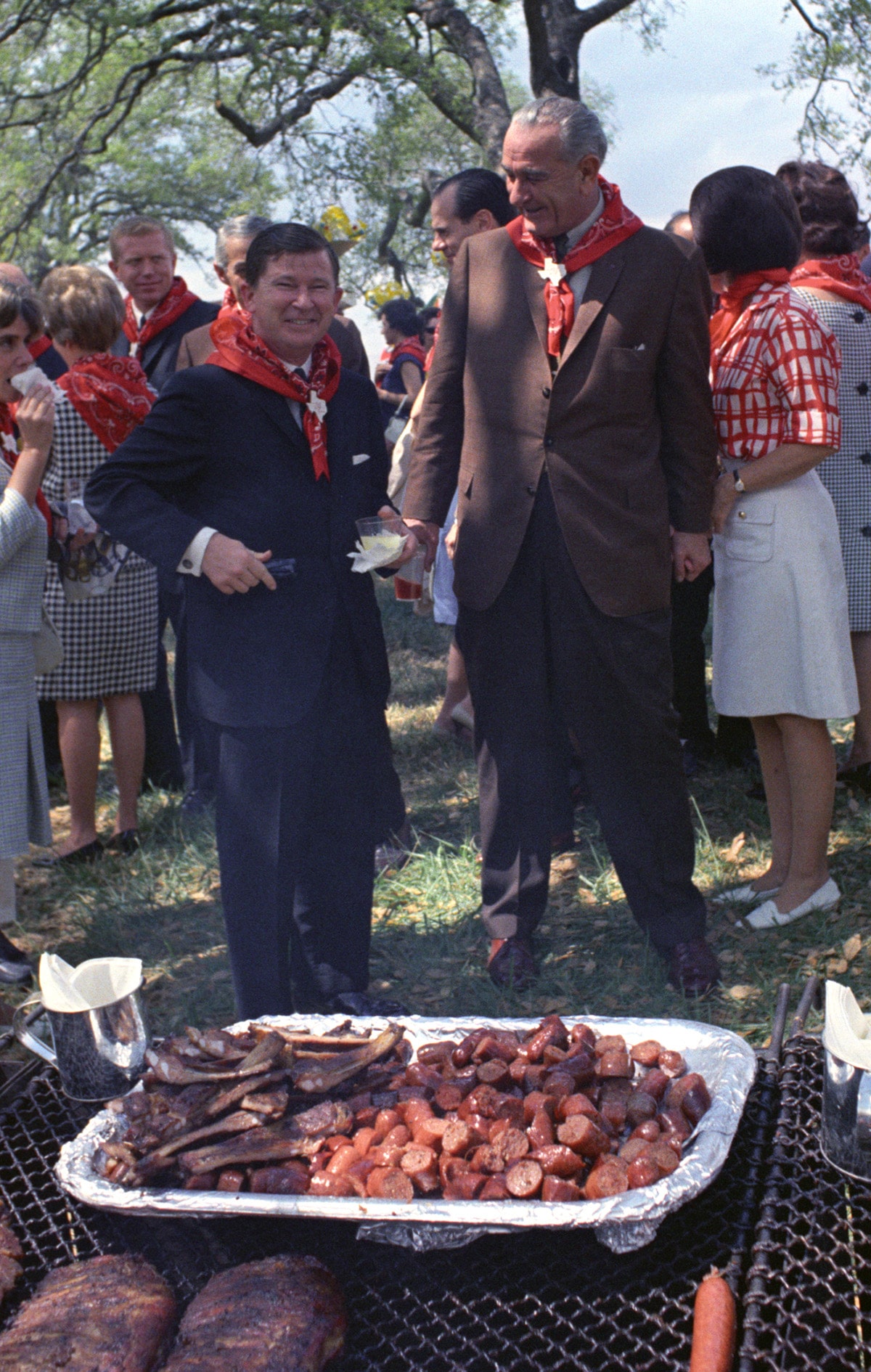 LBJ in the buffet line with Nellie Connally (left) and Mrs. Guillermo Sevilla-Sacasa, Latin American Ambassadors' Weekend, 4/1/1967, by Yoichi R. Okamoto, with permission of the LBJ Library & Museum.