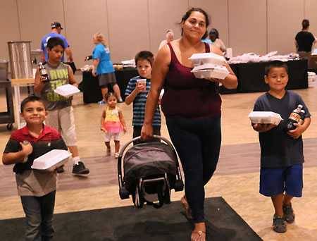 Welcome relief for a hungry famil from Operation BBQ Relief Welcome relief for a hungry famil from Operation BBQ Relief