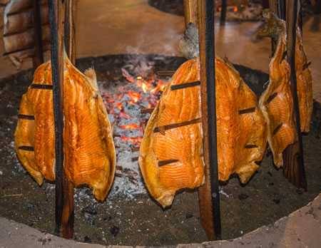 Tillicum people cook salmon the same way as always Tillicum people cook salmon the same way as always