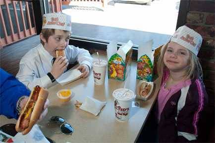 Kids_eating_hot_dogs_at_Ted_s_in_Buffalo Kids eating hot dogs at Ted's in Buffalo