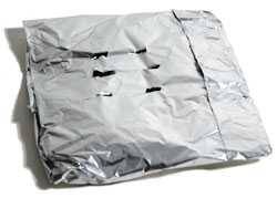 foil packet containing wood chips for smoking foil packet containing wood chips for smoking