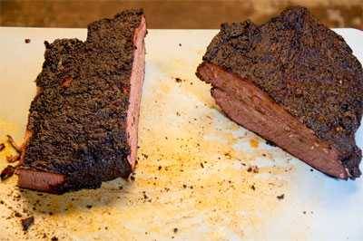 BBQ brisket cut in half during the Barry Sorkin brisket slicing method.