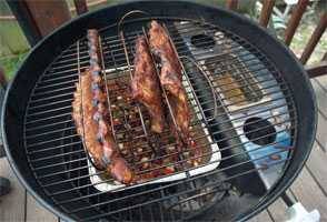 smokenator setup on a charcoal grill using the indirect method smokenator setup on a charcoal grill using the indirect method