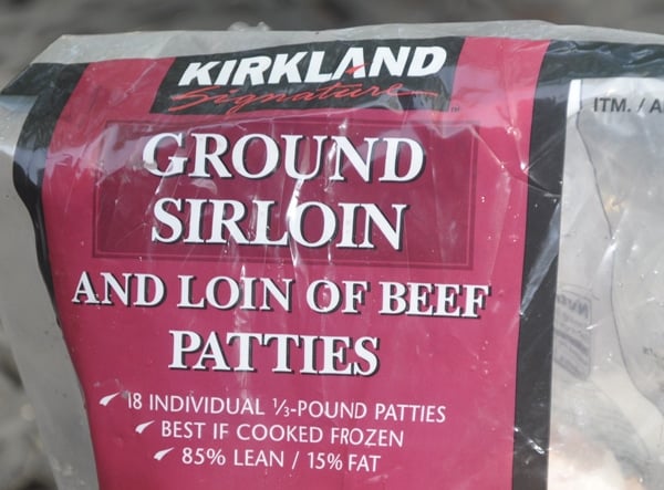 A plastic bag labeled "Kirkland Ground Sirloin and Loin Beef Patties."