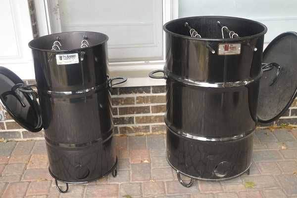 two barrel smokers, one small, one large
